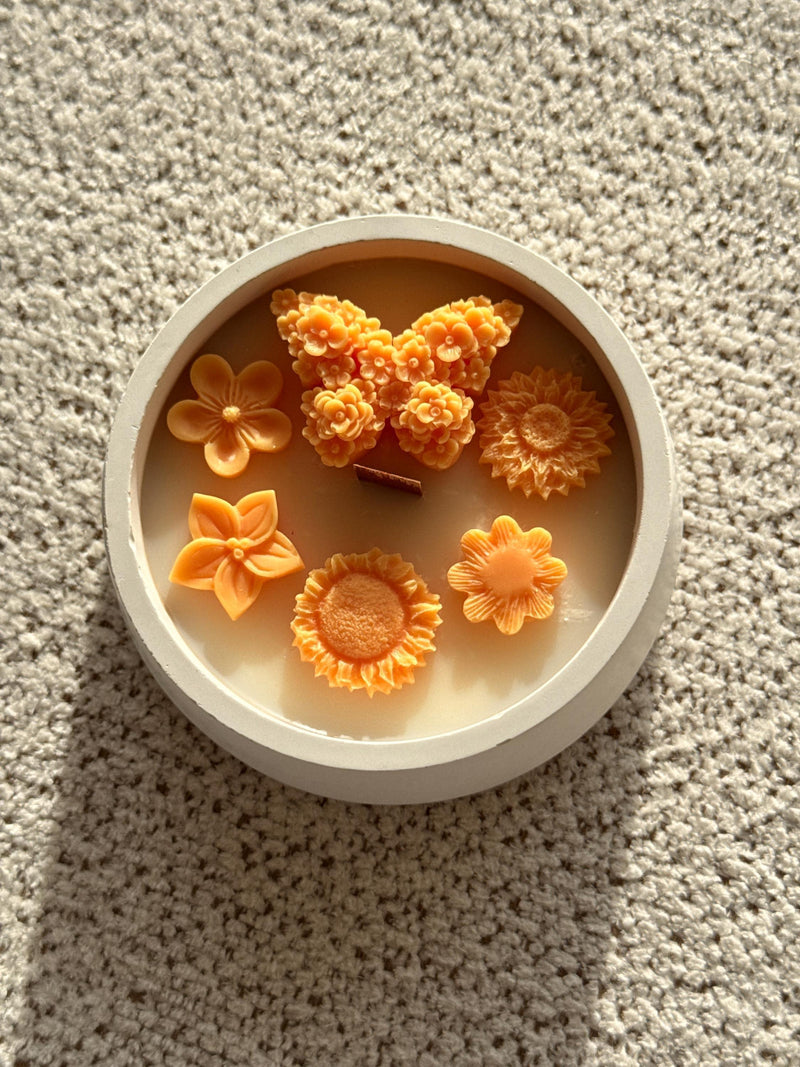 Handmade soy candle with orange flower and butterfly wax art, Scandinavian home decor