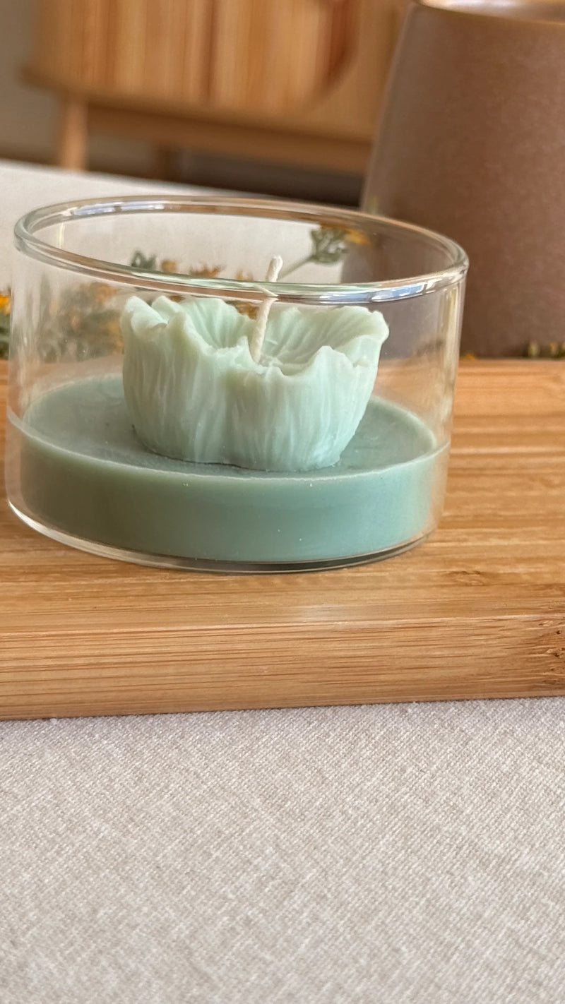 Handmade soy candle in clear glass jar with flower-shaped wax, Scandinavian home decor