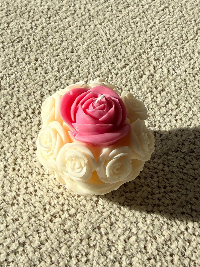 Handmade soy candle shaped like a pink rose with cream petals, Scandinavian home decor