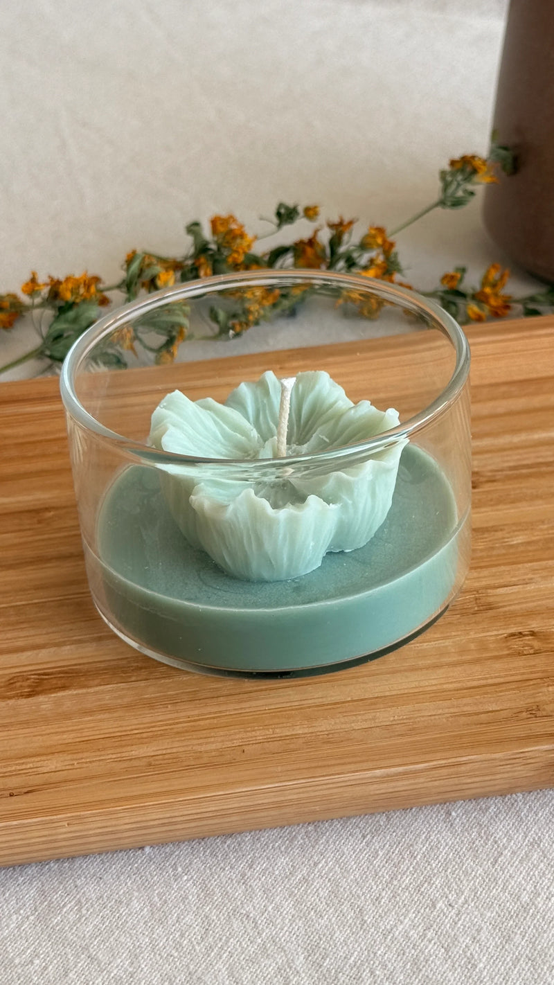 Handmade soy candle with flower design in glass jar, Scandinavian home decor