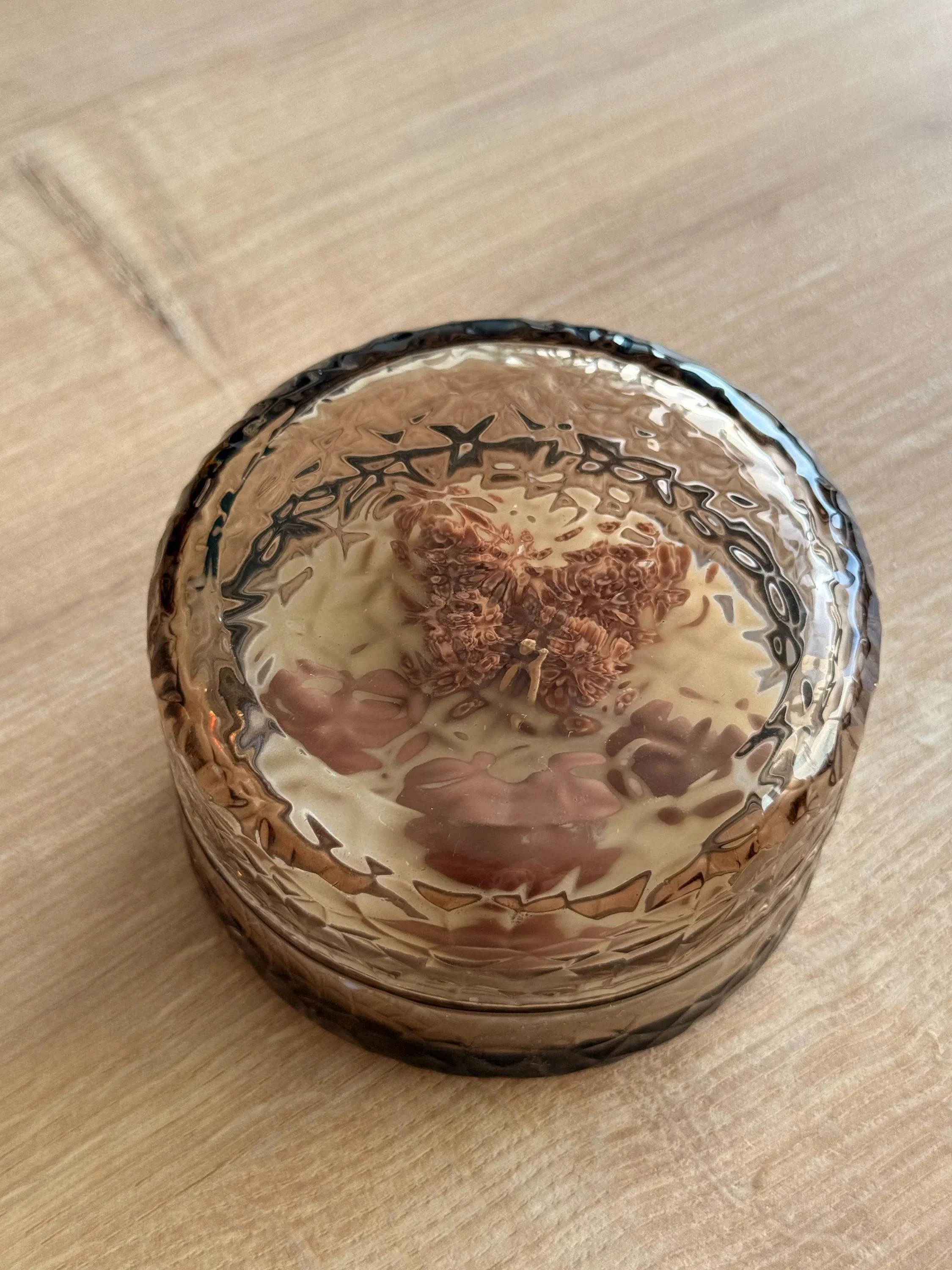 Handmade soy candle in textured amber glass jar, Scandinavian home decor, cozy ambiance