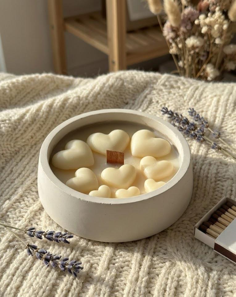 Heart-shaped soy wax melts in ceramic bowl with lavender, cozy Scandinavian home décor