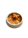 Handmade soy candle with orange flower wax melts in a ceramic bowl, Scandinavian home decor