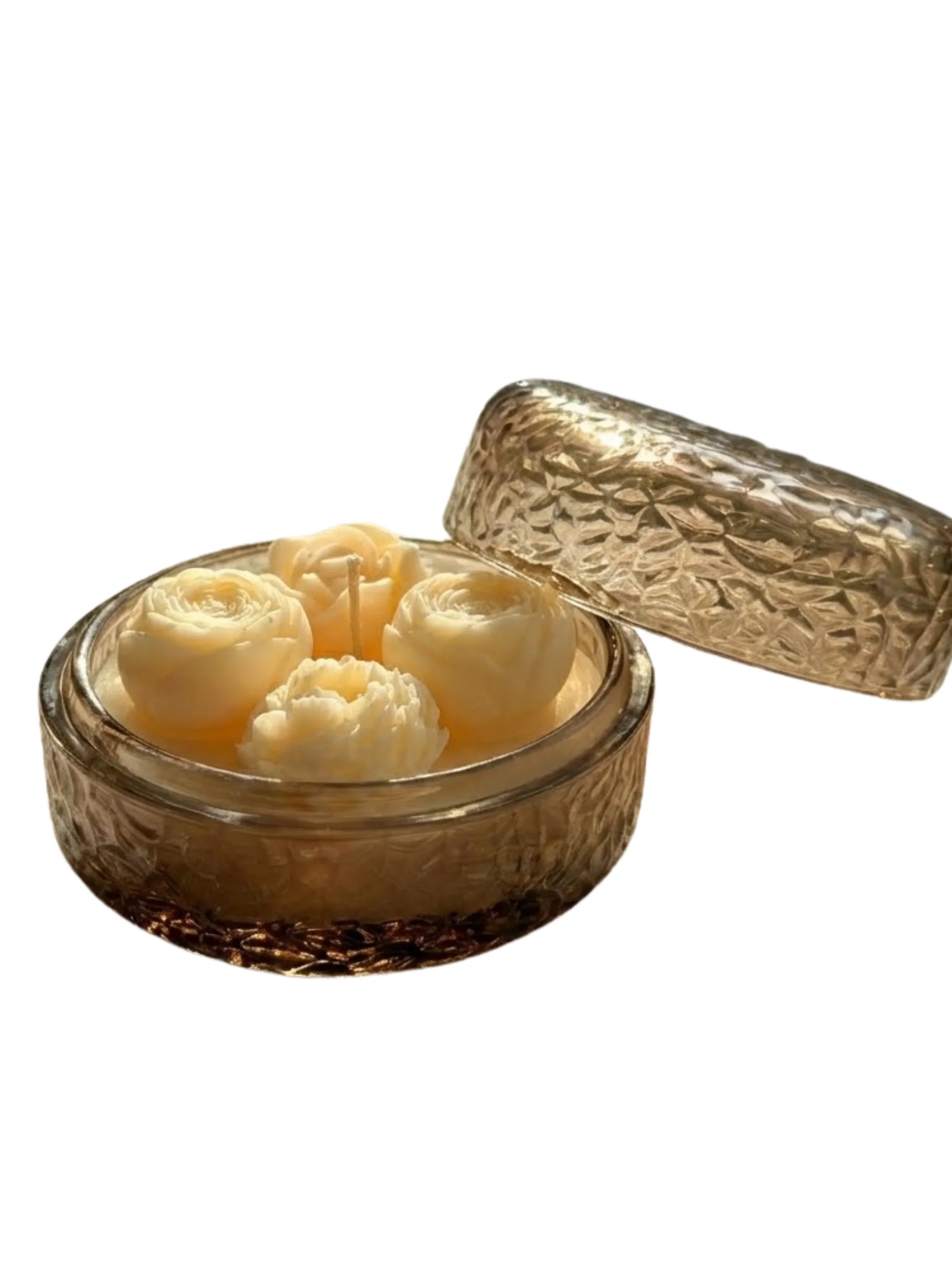 Handmade soy candle with rose-shaped wax blooms in a textured glass jar, Scandinavian home décor