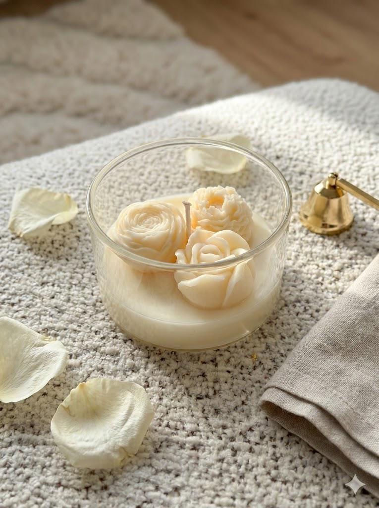 Handmade soy candle with rose-shaped wax blooms in glass jar, cozy Scandinavian home décor
