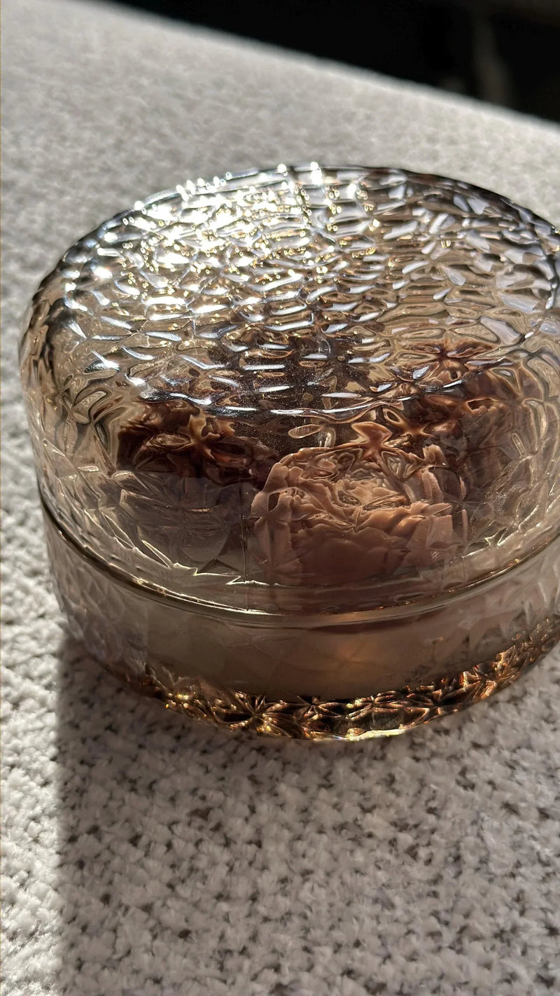 Textured glass candle holder with floral design, perfect for Scandinavian home decor and cozy ambiance