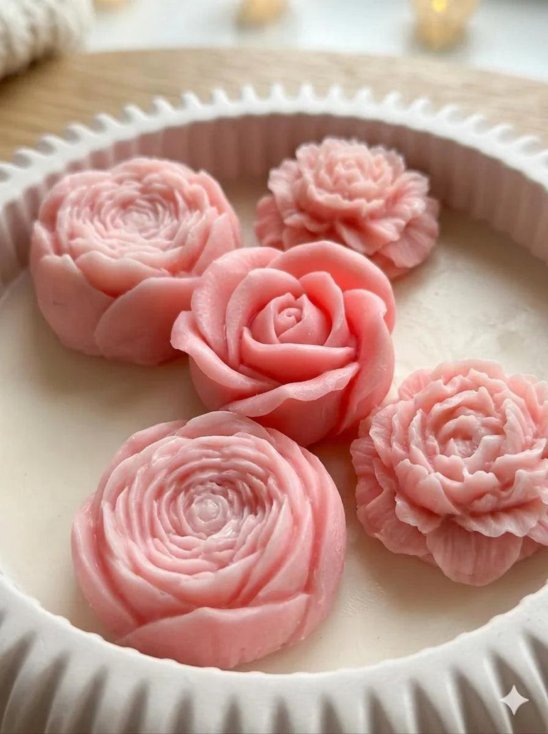 Pink rose-shaped soy wax melts in white ceramic dish, Scandinavian home decor